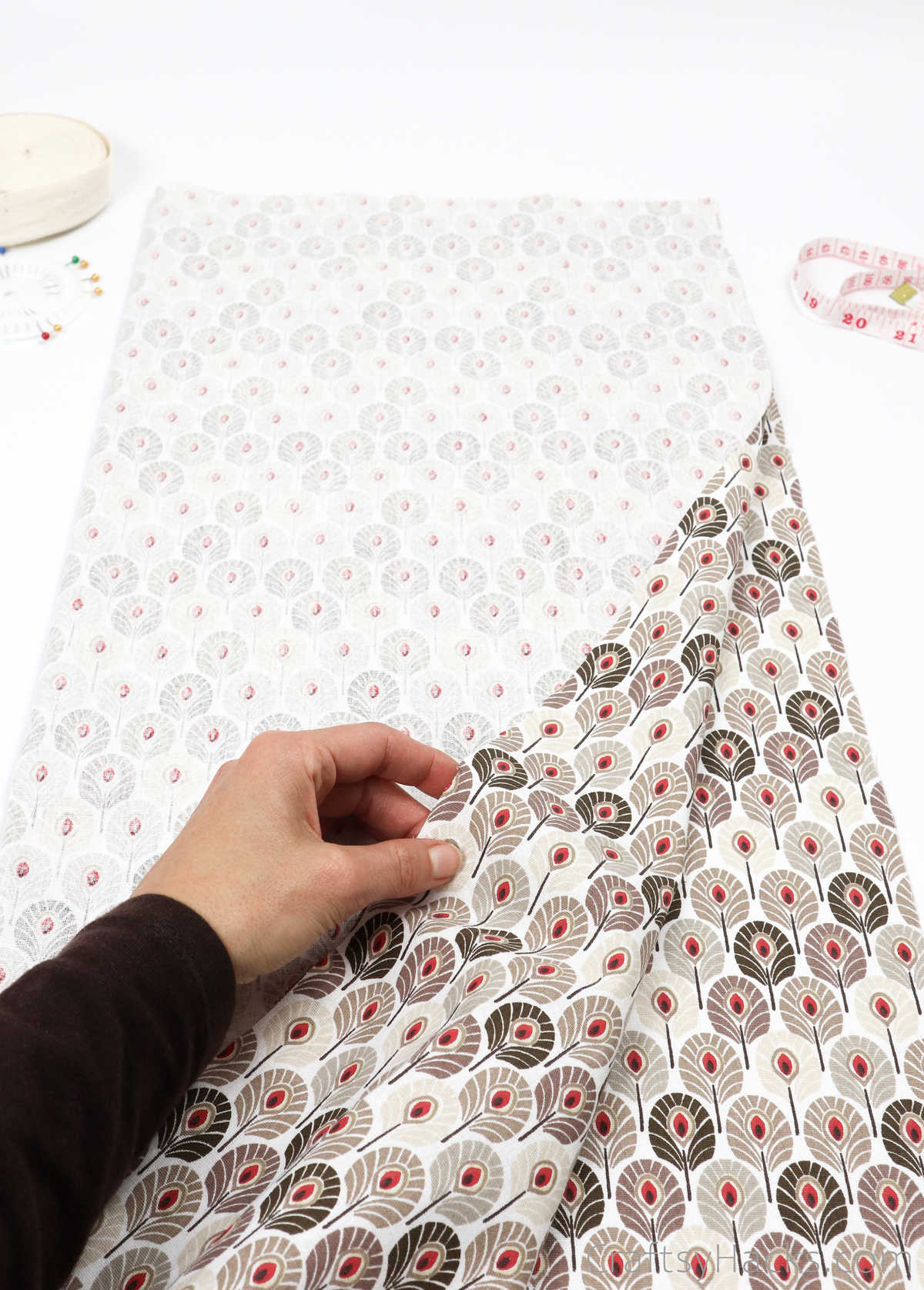 holding patterned fabric