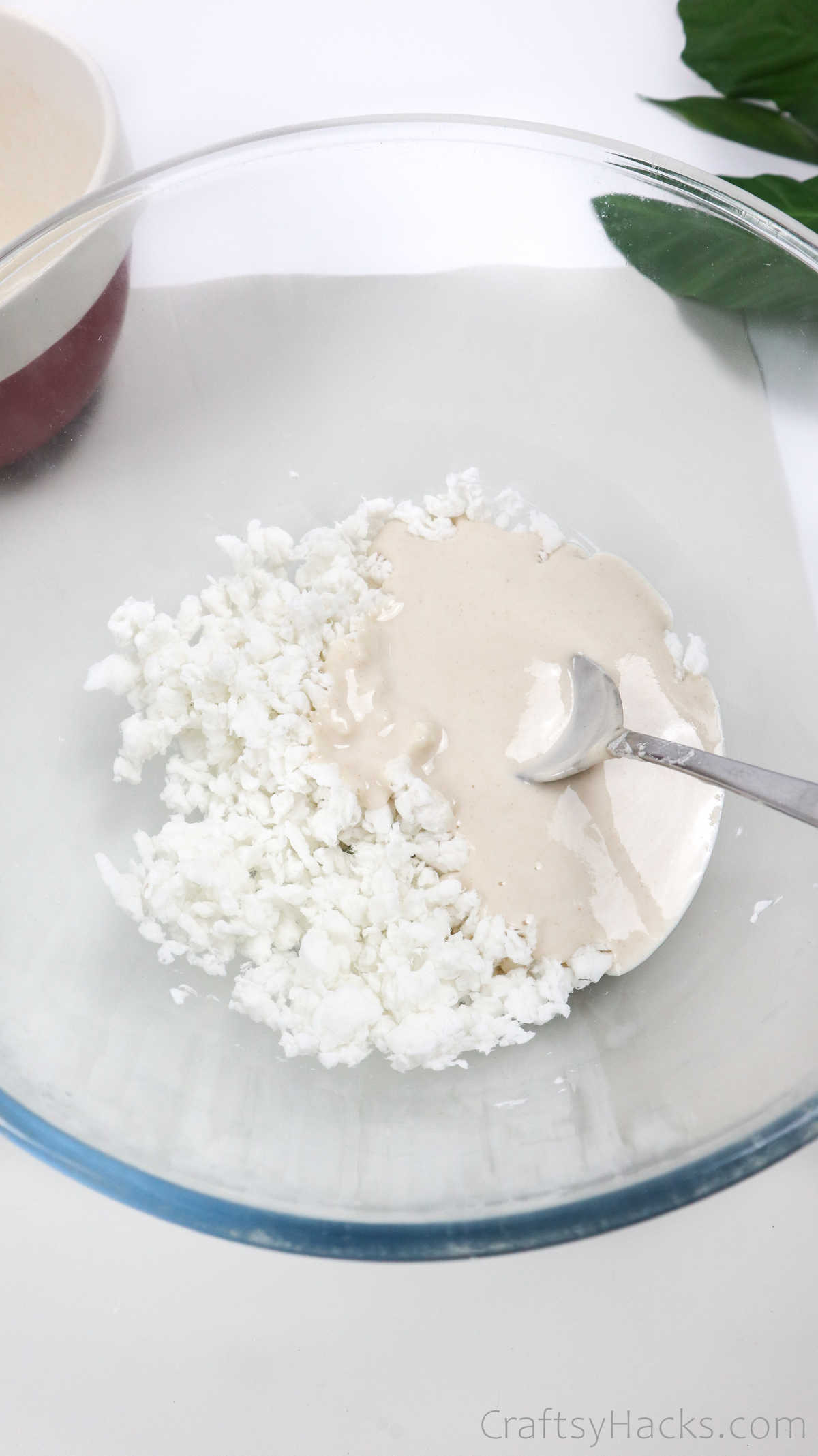 adding flour to paper mix