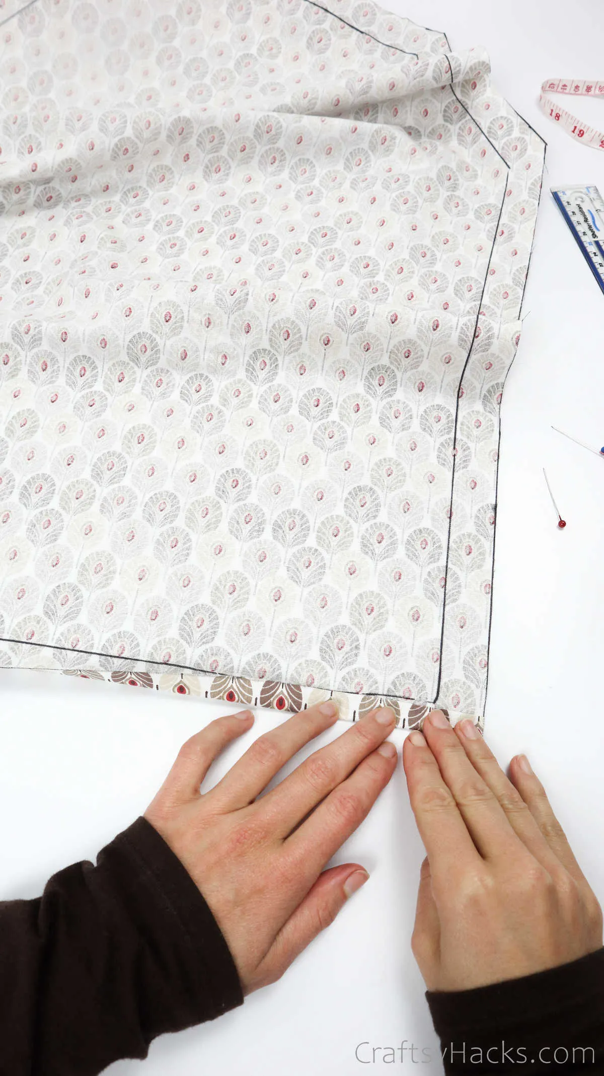 folding edges of fabric
