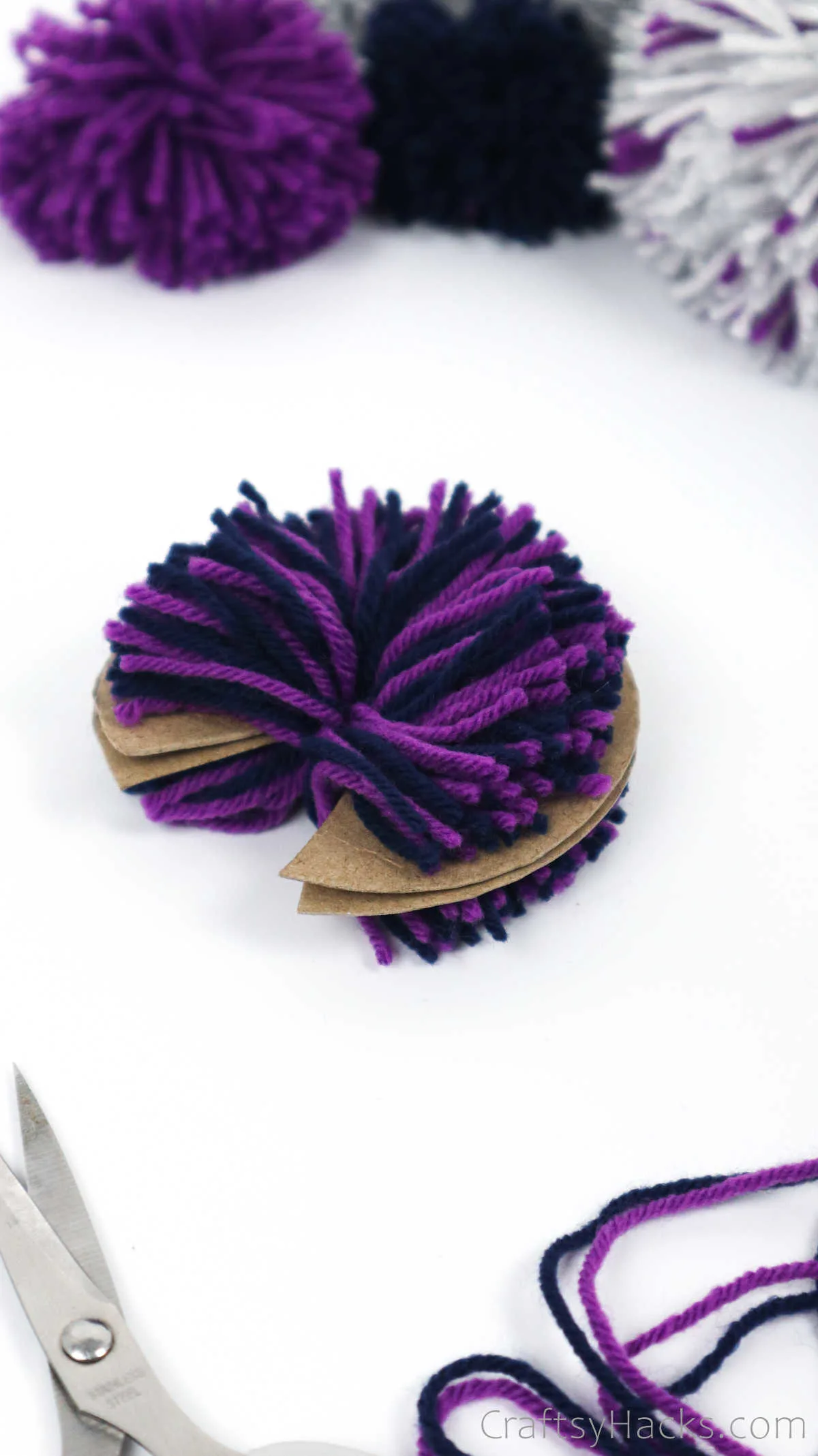 cut yarn pom pom