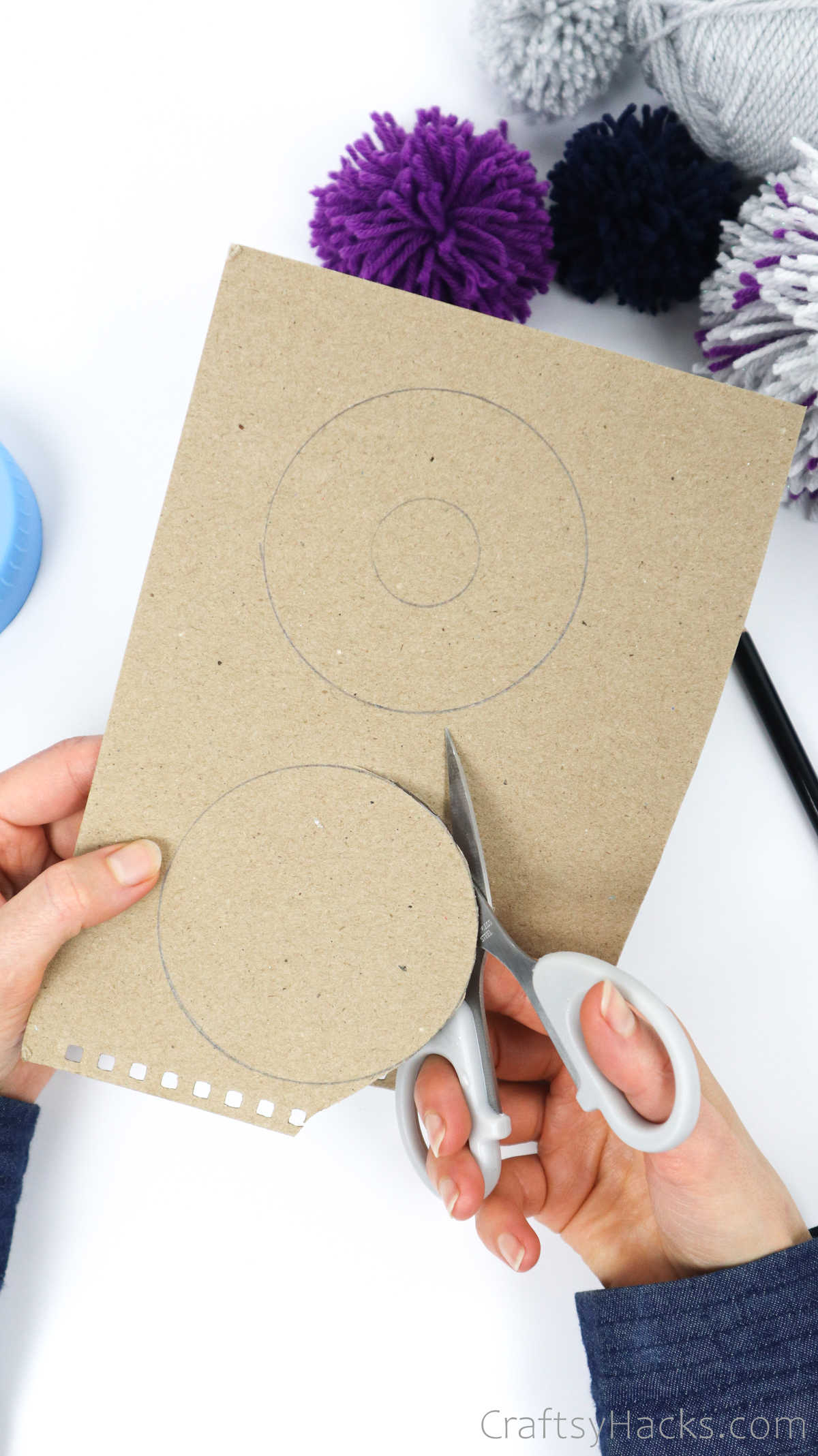 cutting out cardboard circle