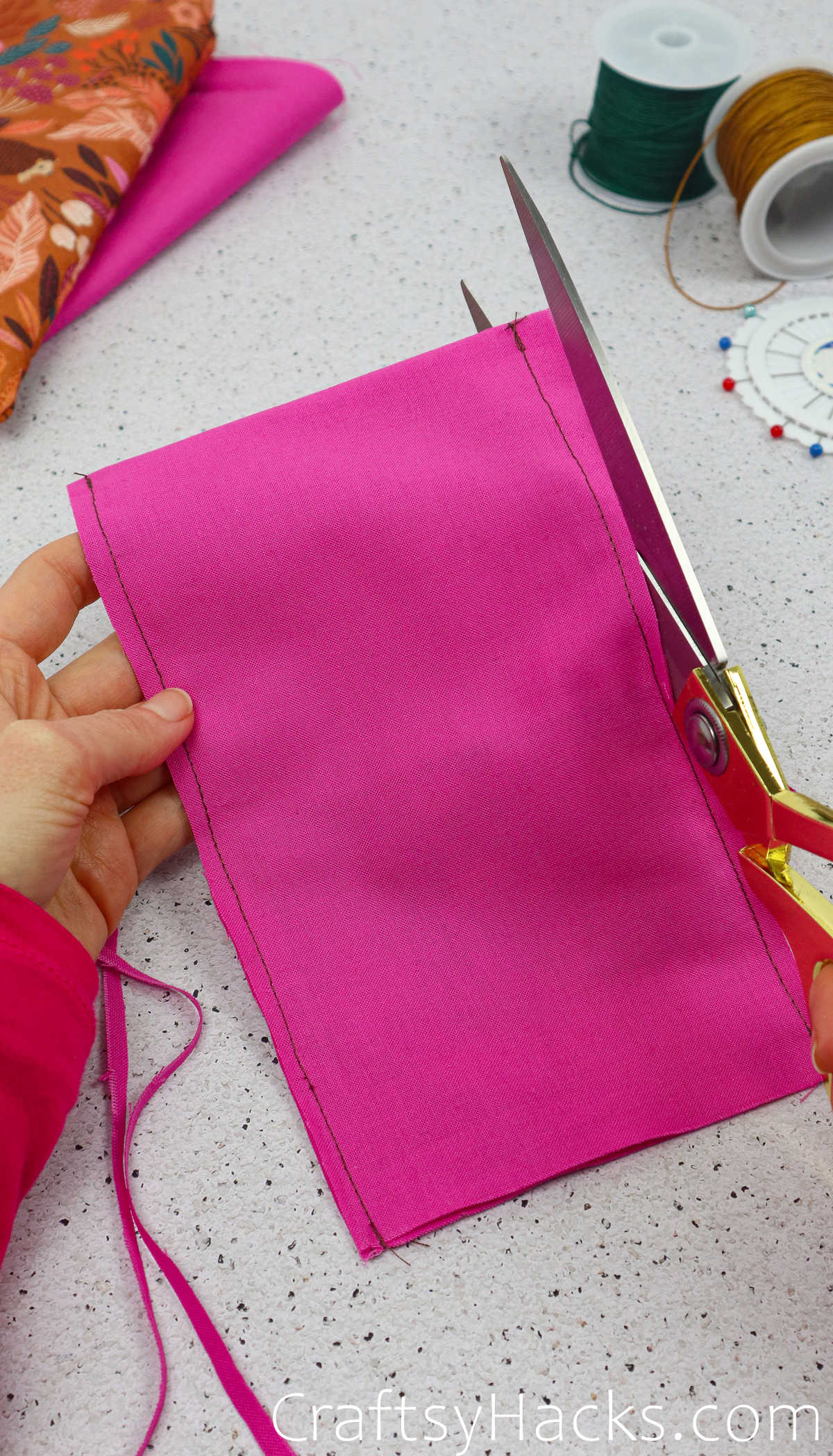 cutting excess fabric