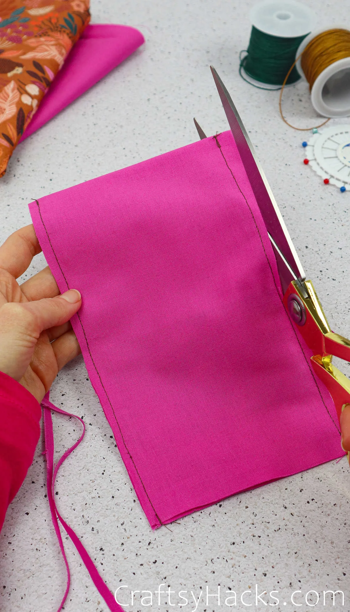 cutting excess fabric