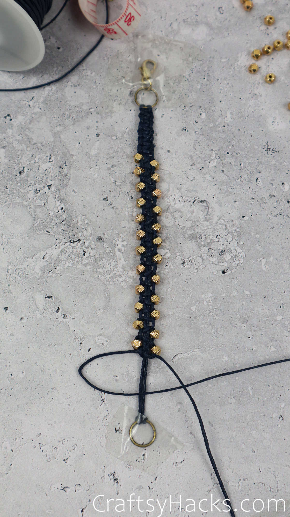 completed macrame knots with beads