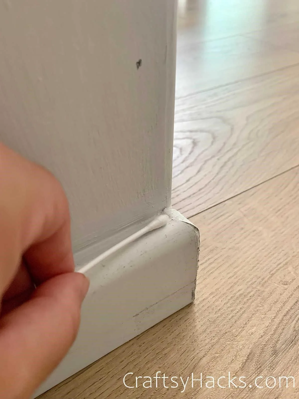 use q-tips to clean baseboards