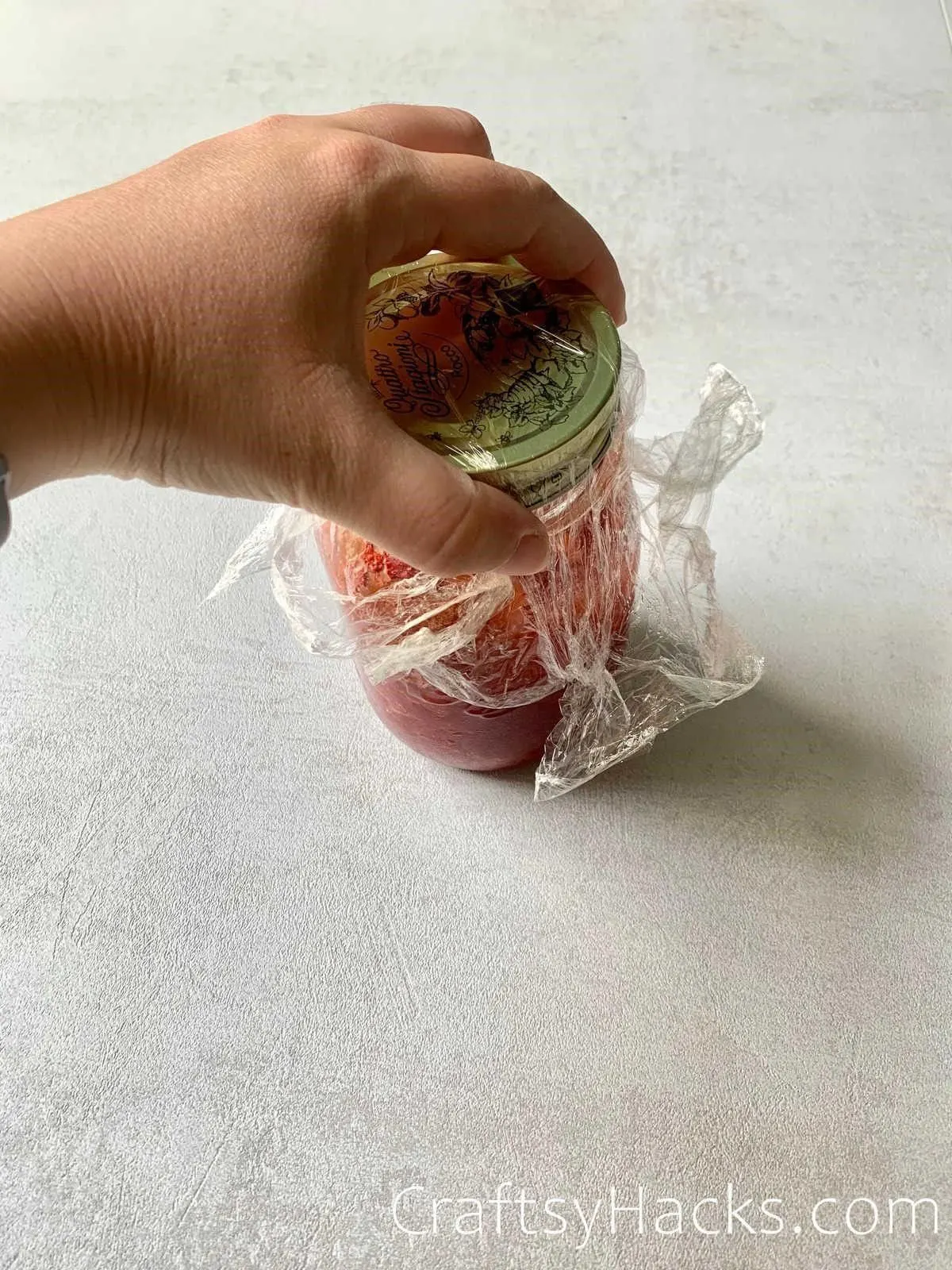 plastic wrap to add grip on jars