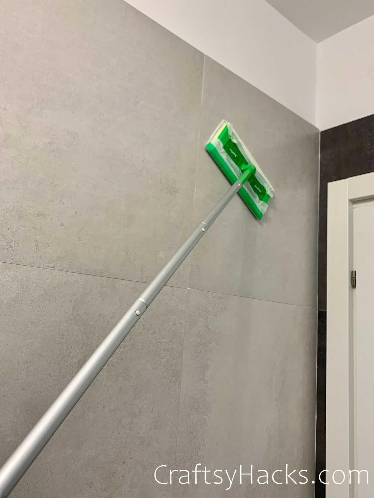 clean bathroom walls with a swiffer