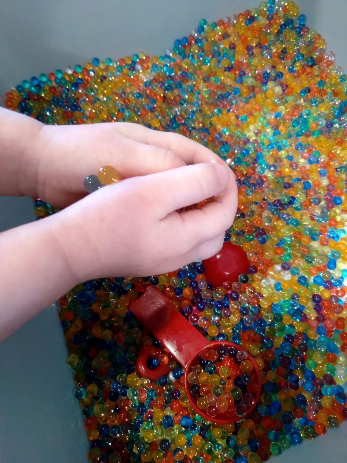 squishy color sorting sensory bin