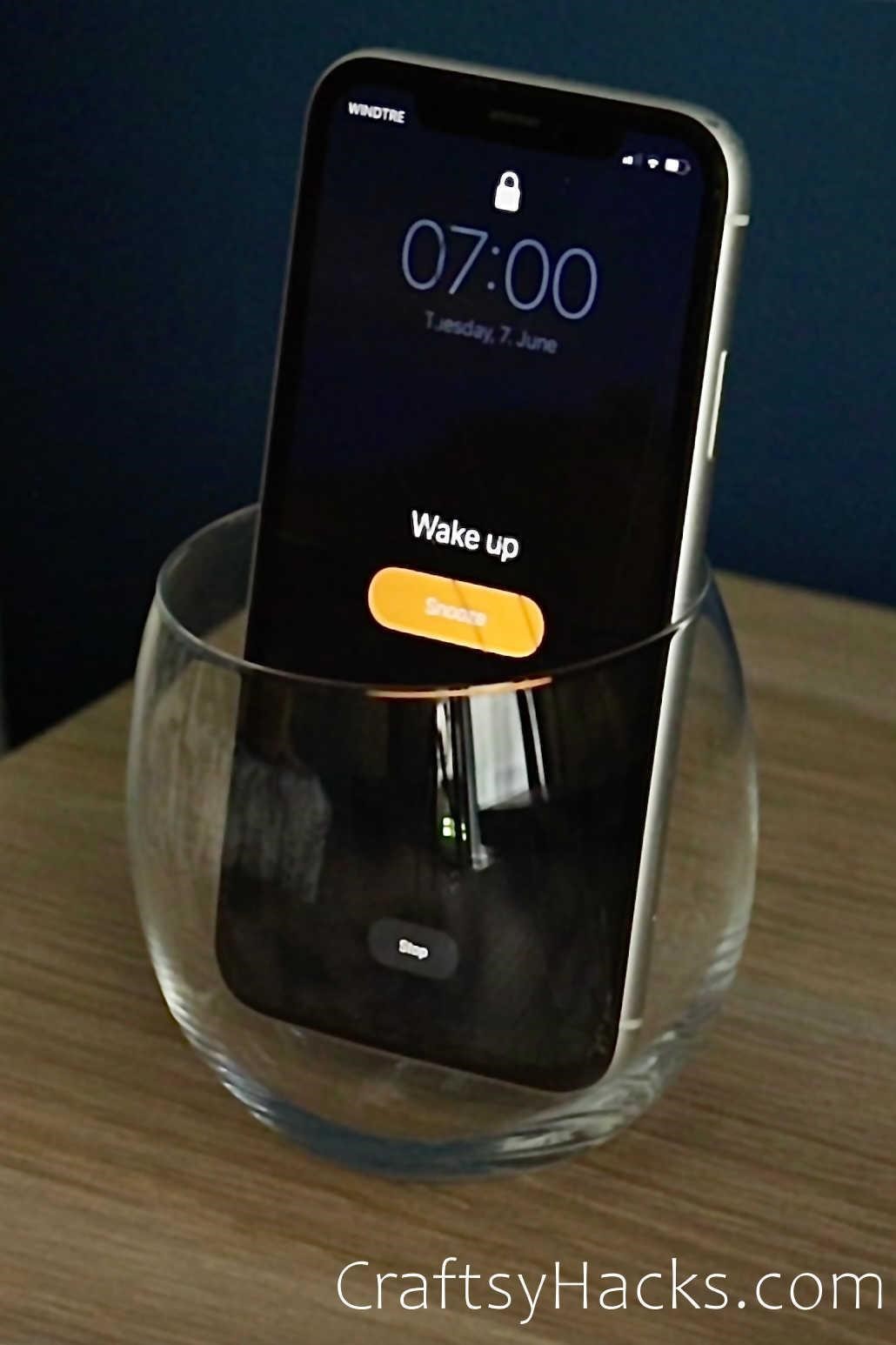 cellphone in glass to increase alarm volume
