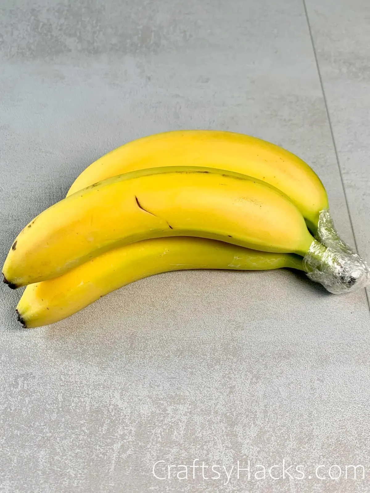 prevent bananas from ripening with saran wrap
