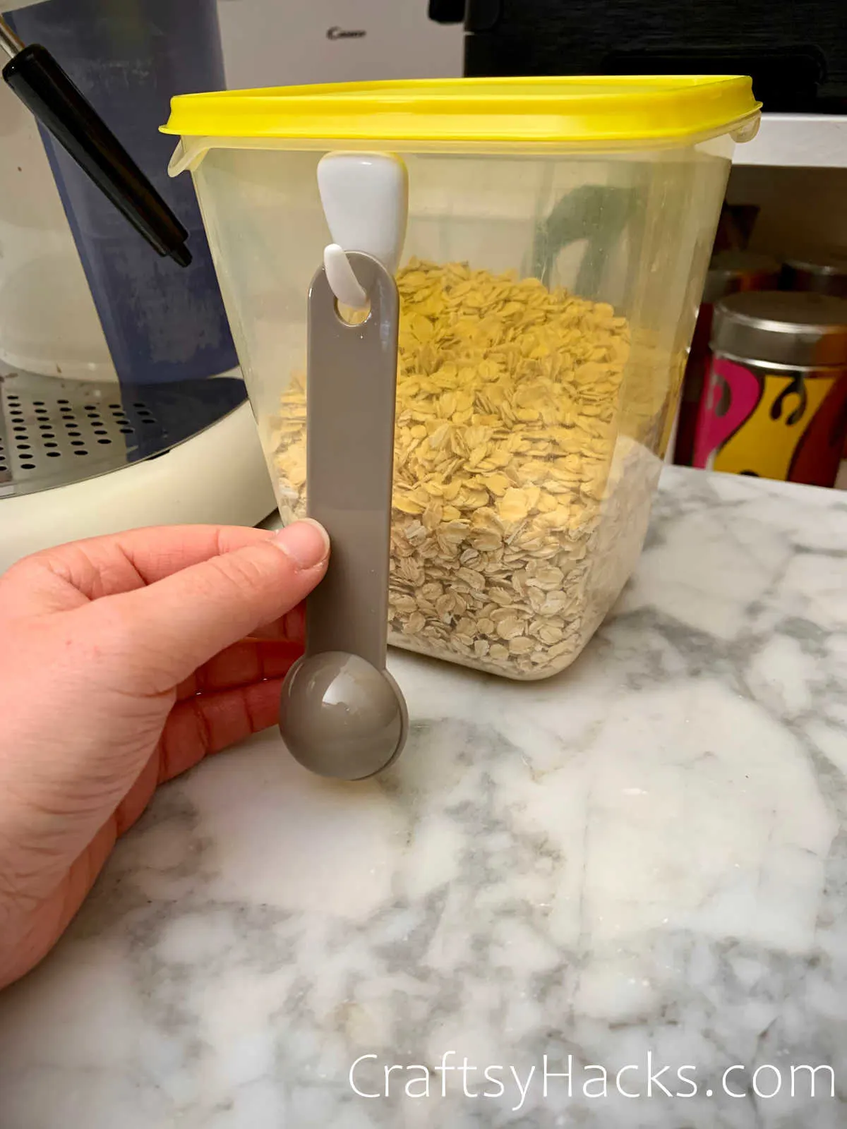 hang measuring spoons on storage container
