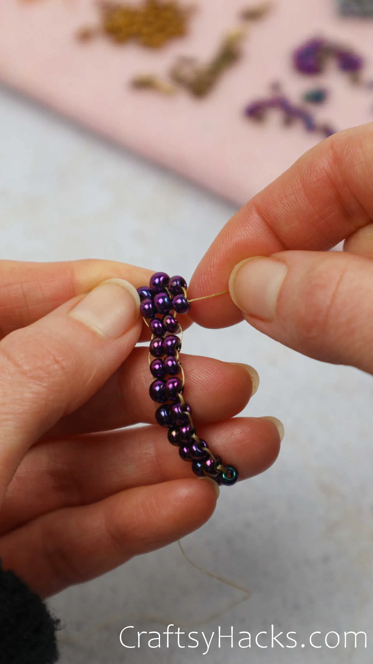 weaving beads together