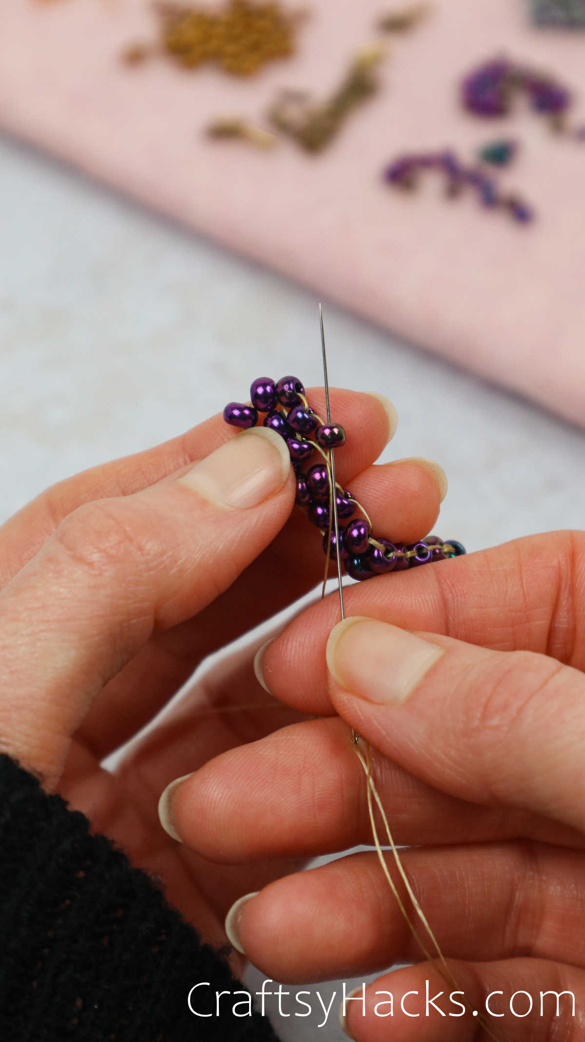 threading beads together