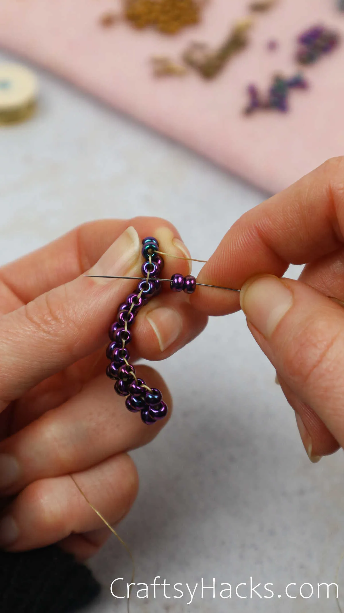threading beads together