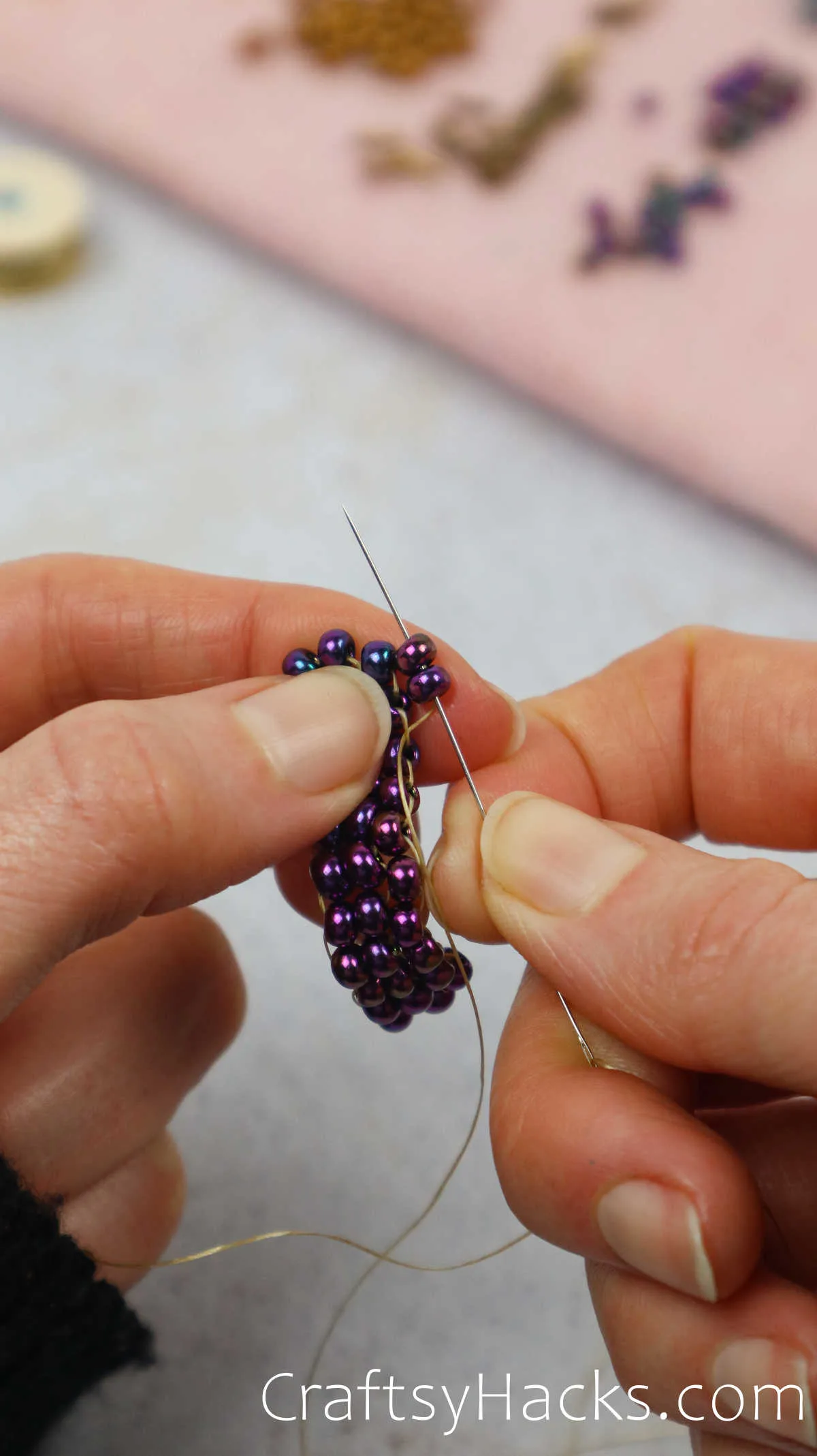 threading beads together