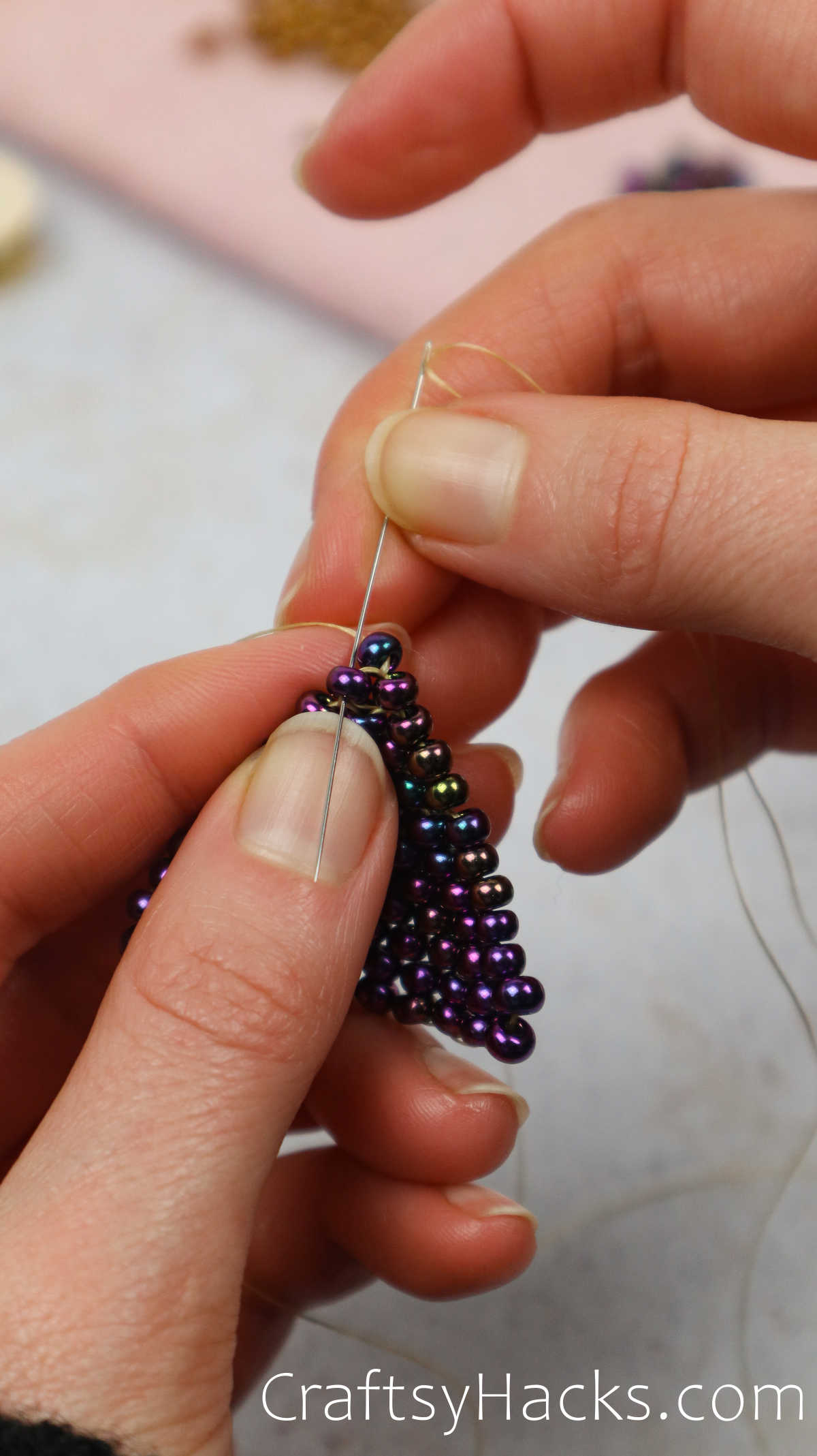 looping the beads together to secure