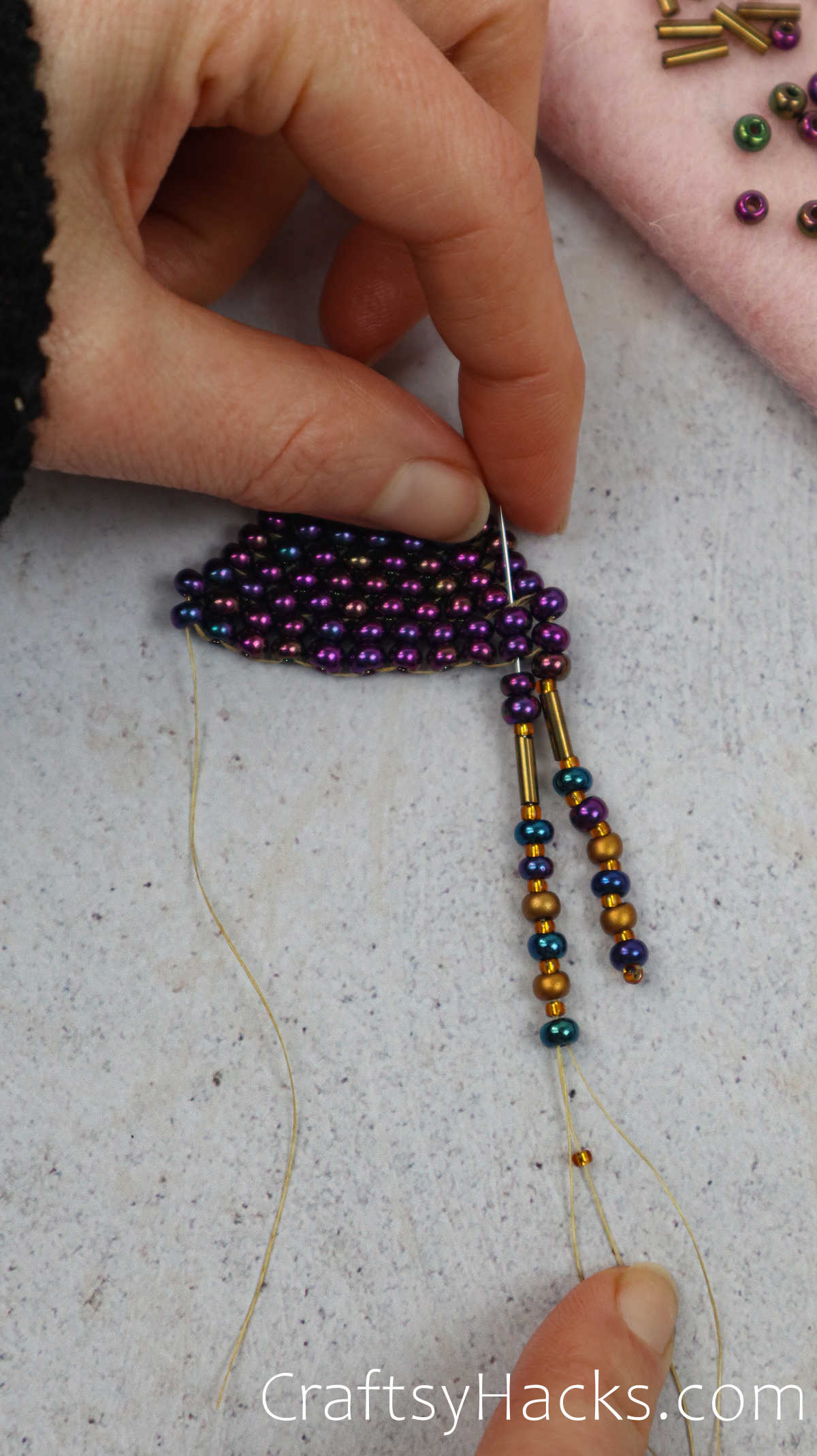 adding beads to the fringe