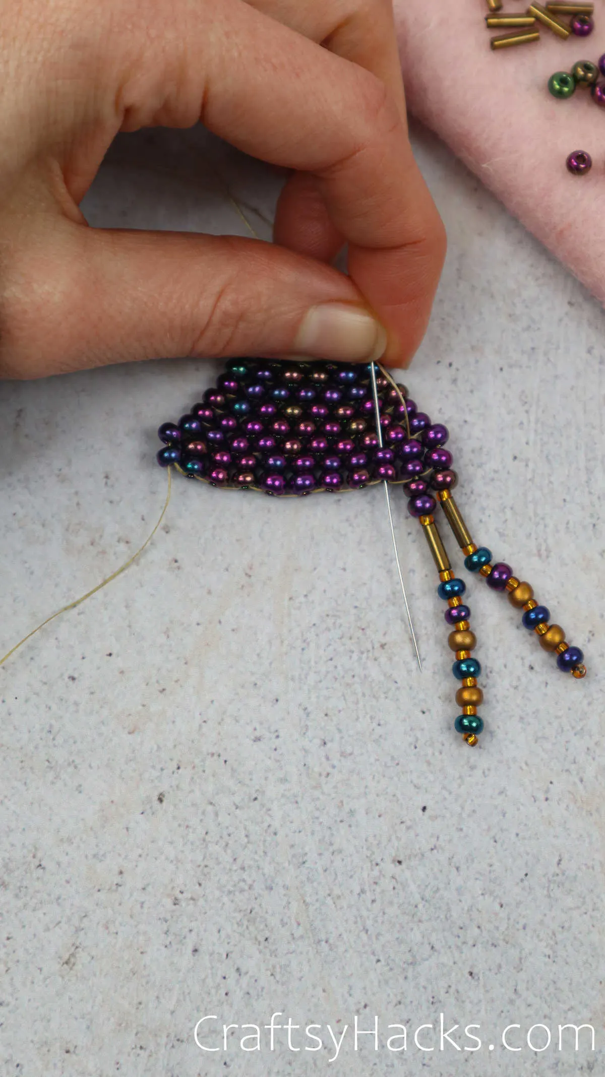 adding beads to the fringe