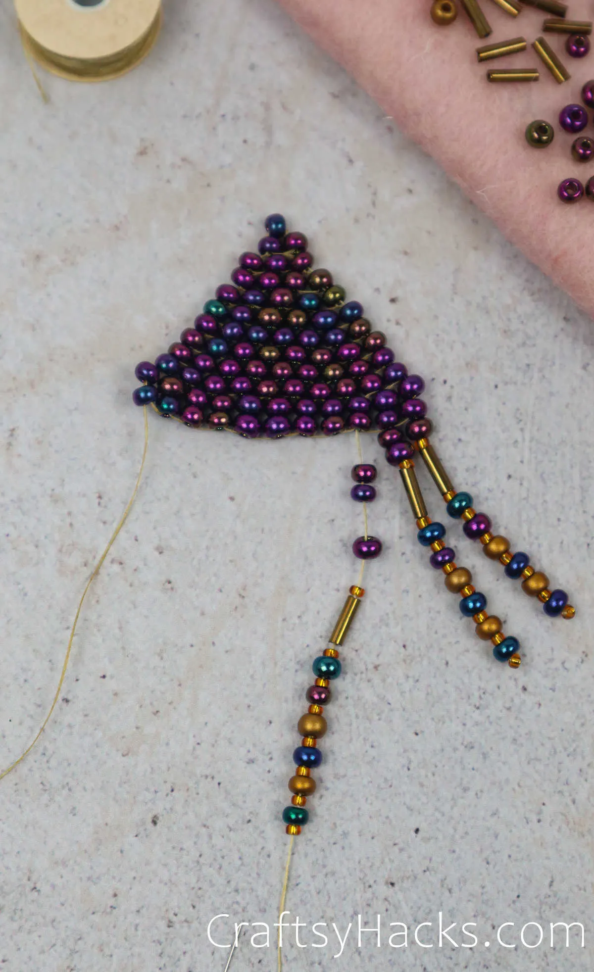 adding beads to the fringe