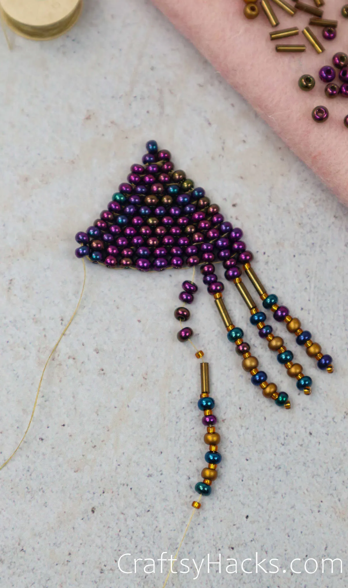 adding beads to the fringe