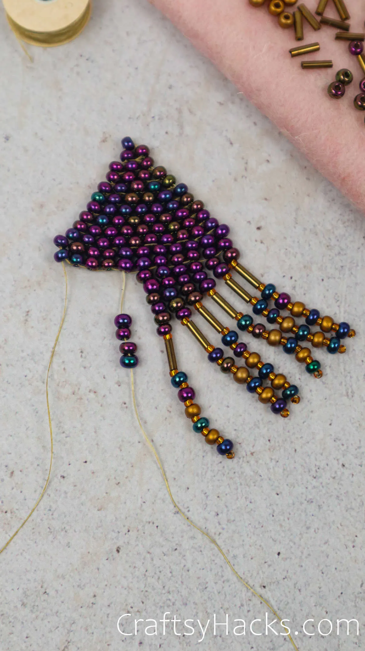 adding beads to the fringe