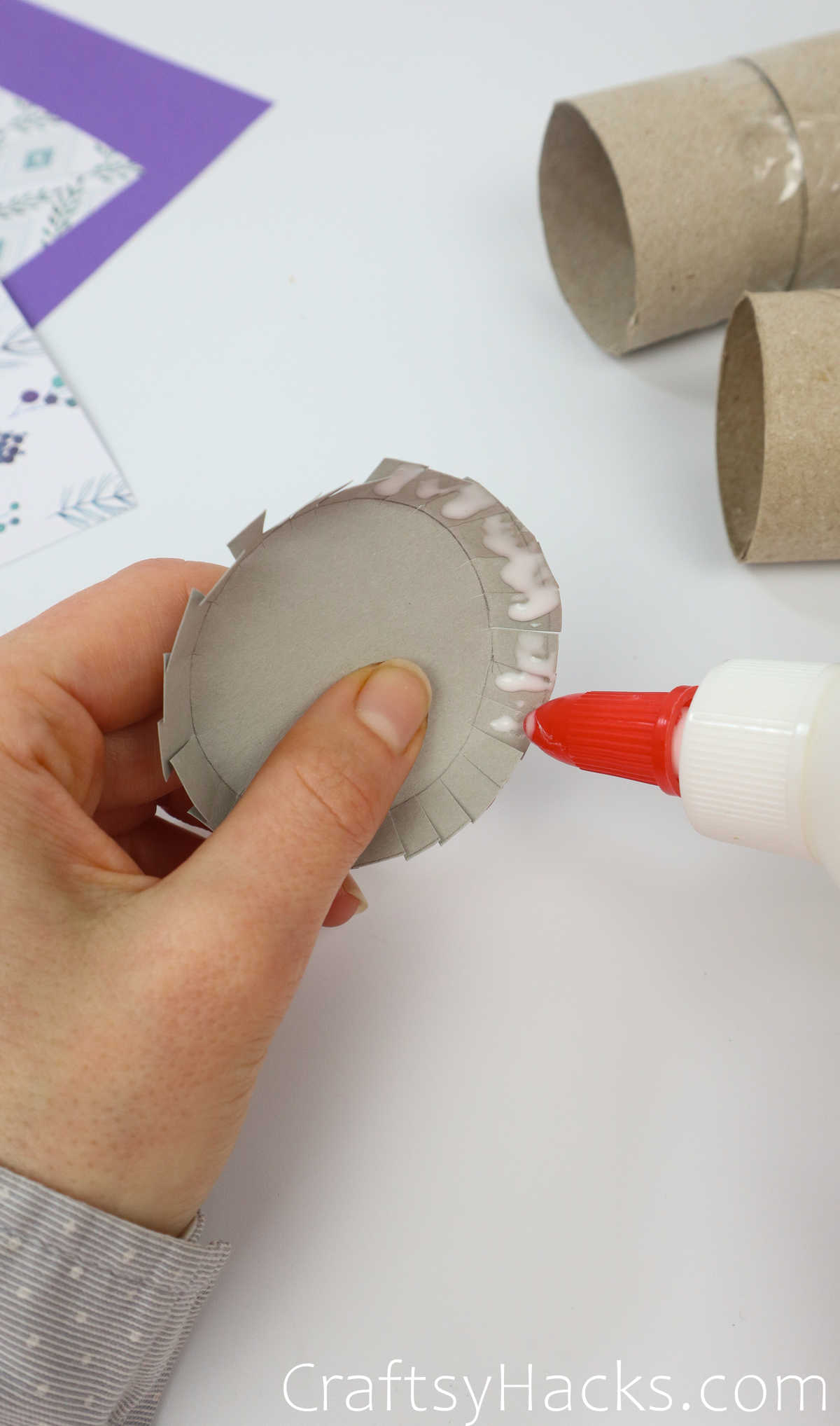 glue circumference and press flaps together