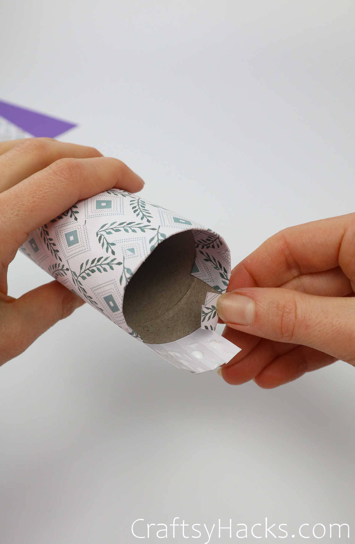 press down flaps into inside of the roll