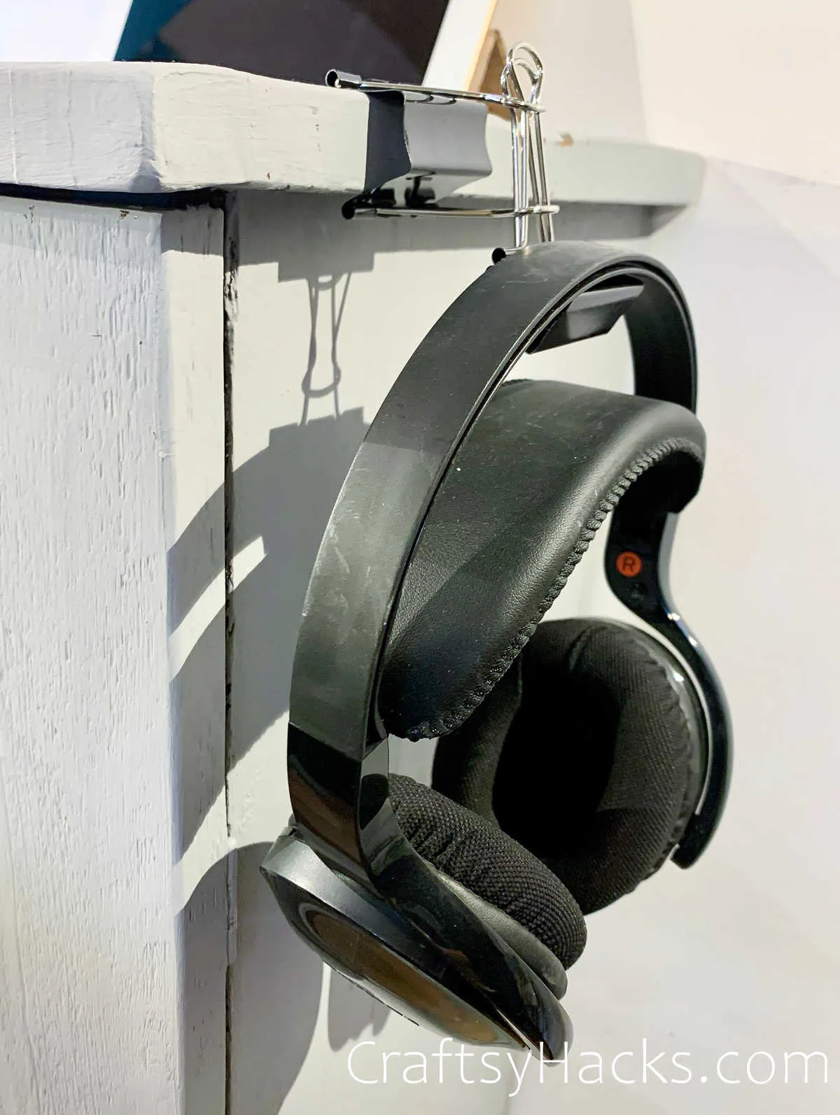 hang headphones on desk with binder clip