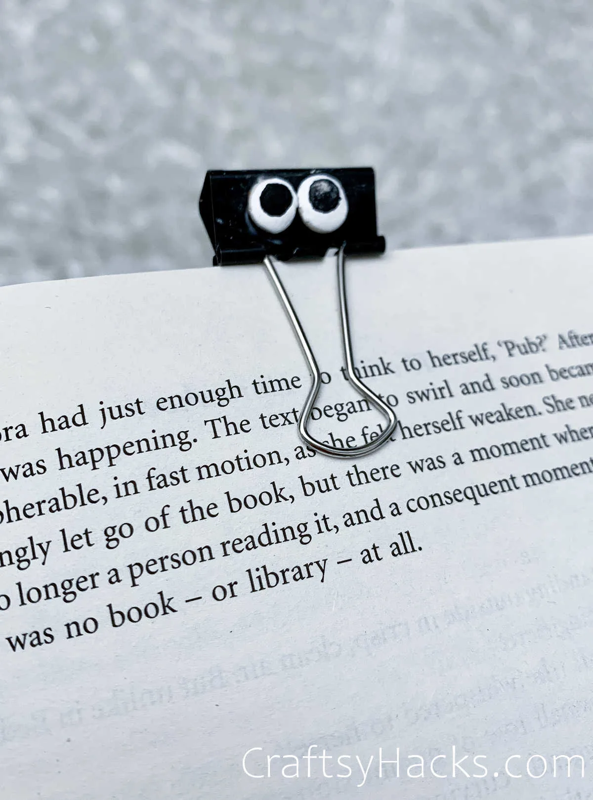 mark your place in a book with binder clip