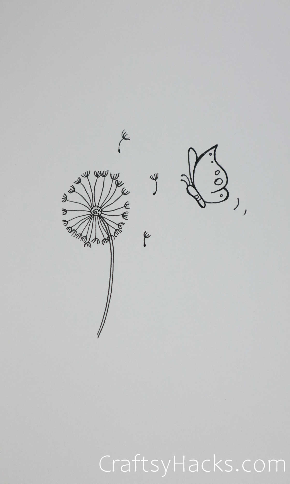 dandelion puff and butterfly