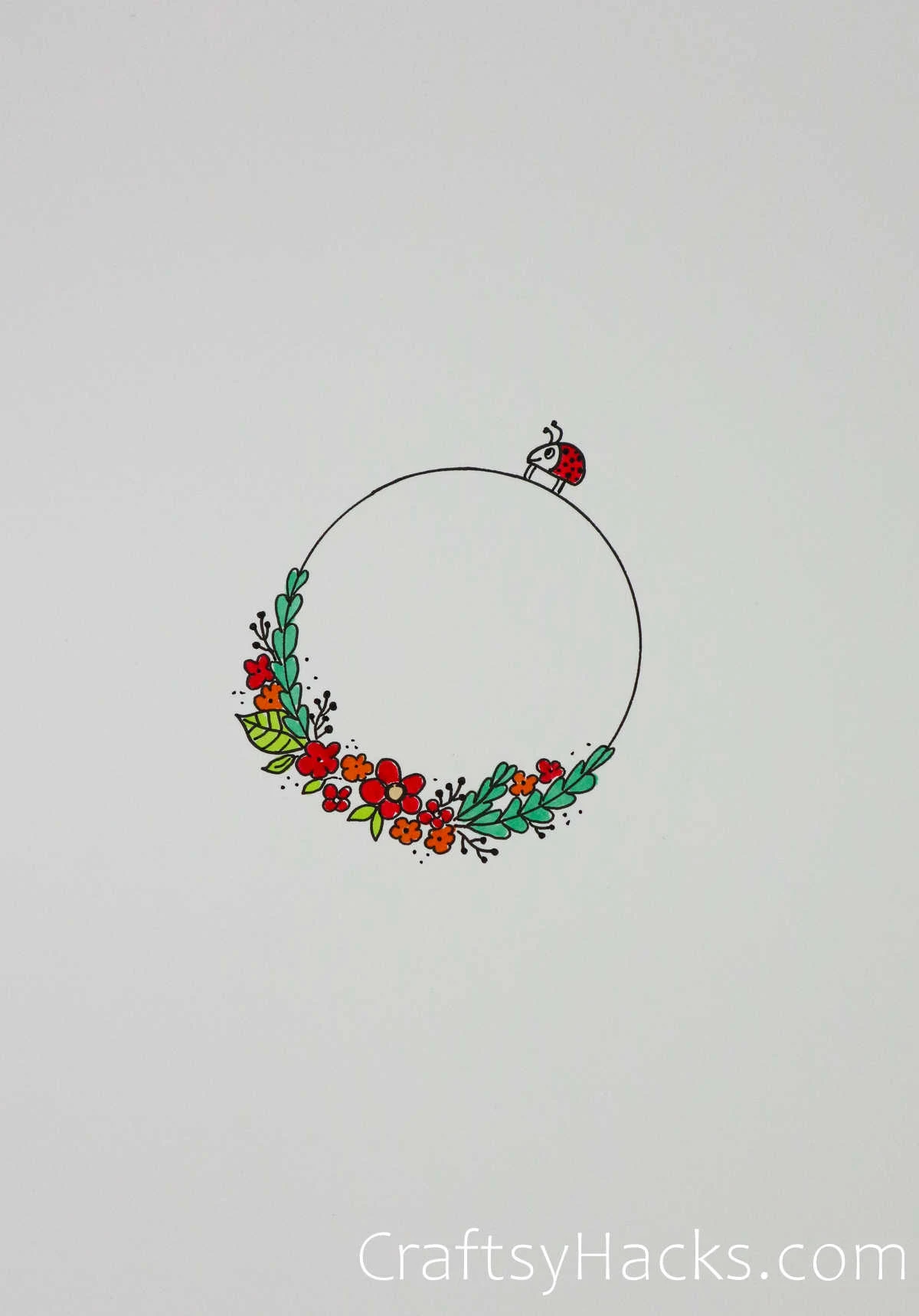floral wreath with lady bug