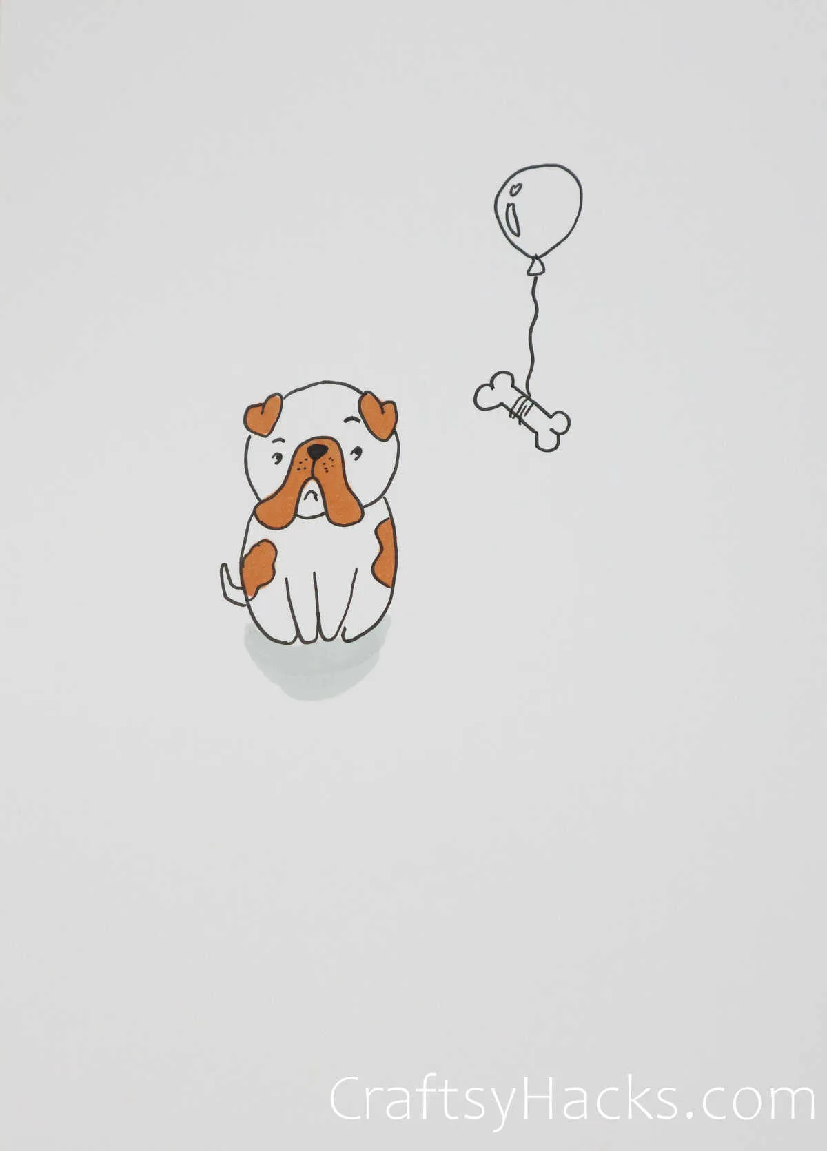 Buddy the dog, his bone and balloon