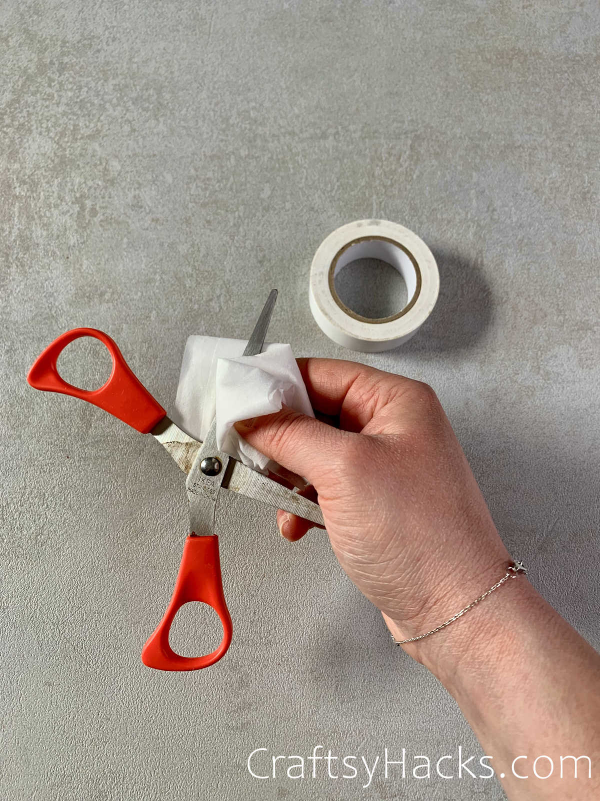 cut sticky tape with baby wipes