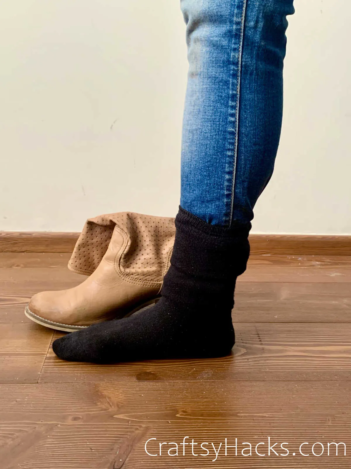 hack to tuck jeans into boots