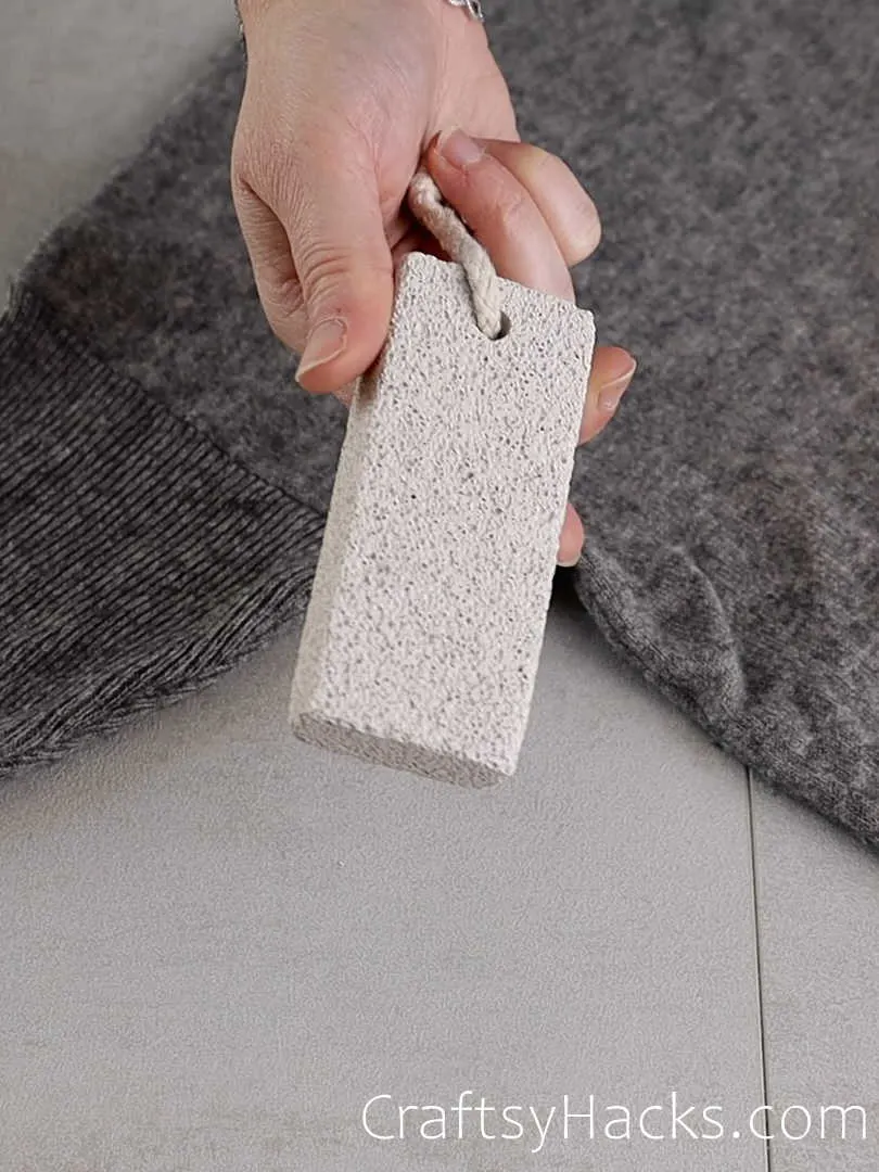 pumice stone hack to defuzz sweaters