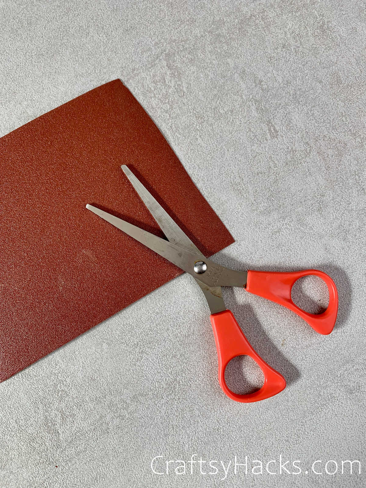 sandpaper to sharpen scissors