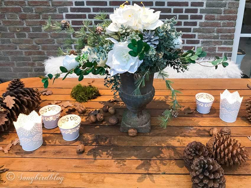 winter faux flower table arrangement