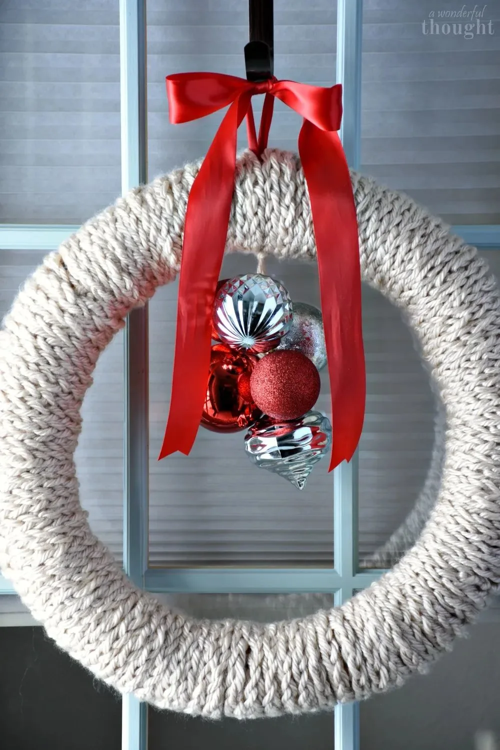 finger knitted Christmas wreath