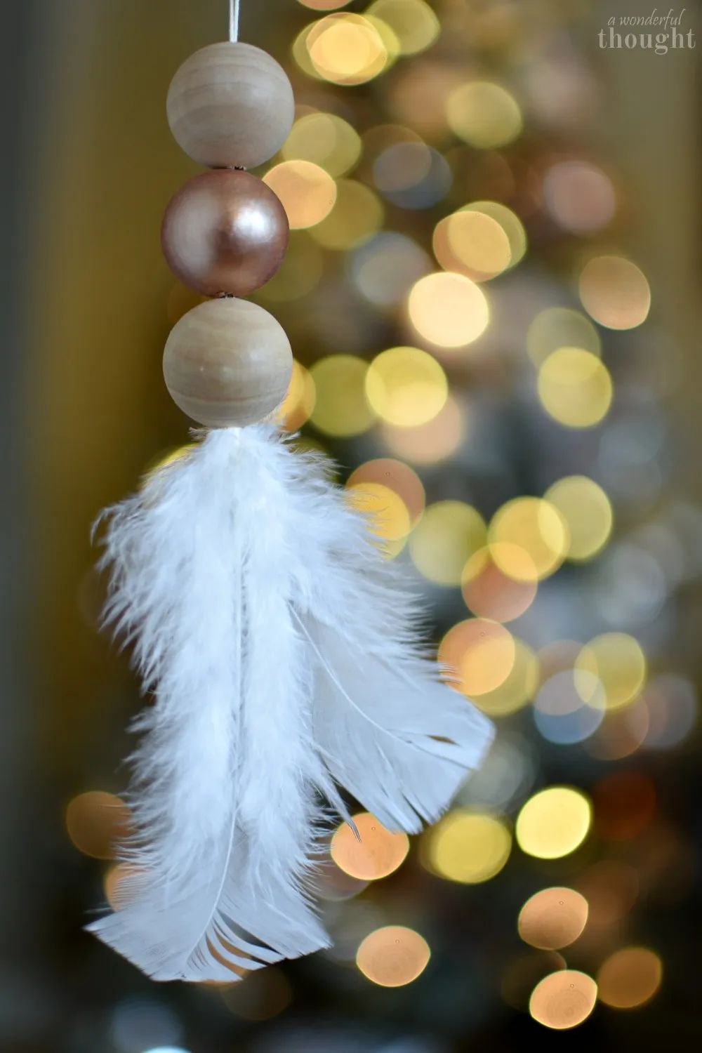 wooden bead feather ornament