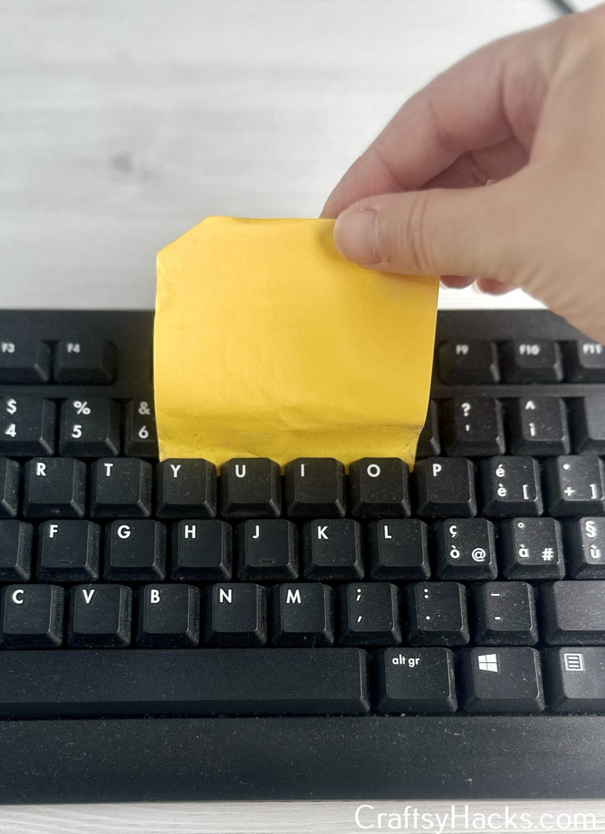 use post it to clean keyboard