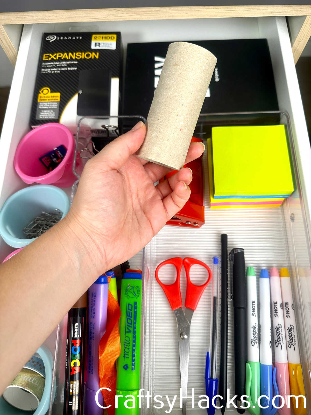 Use a Toilet Paper Roll to Keep Stationary in Place