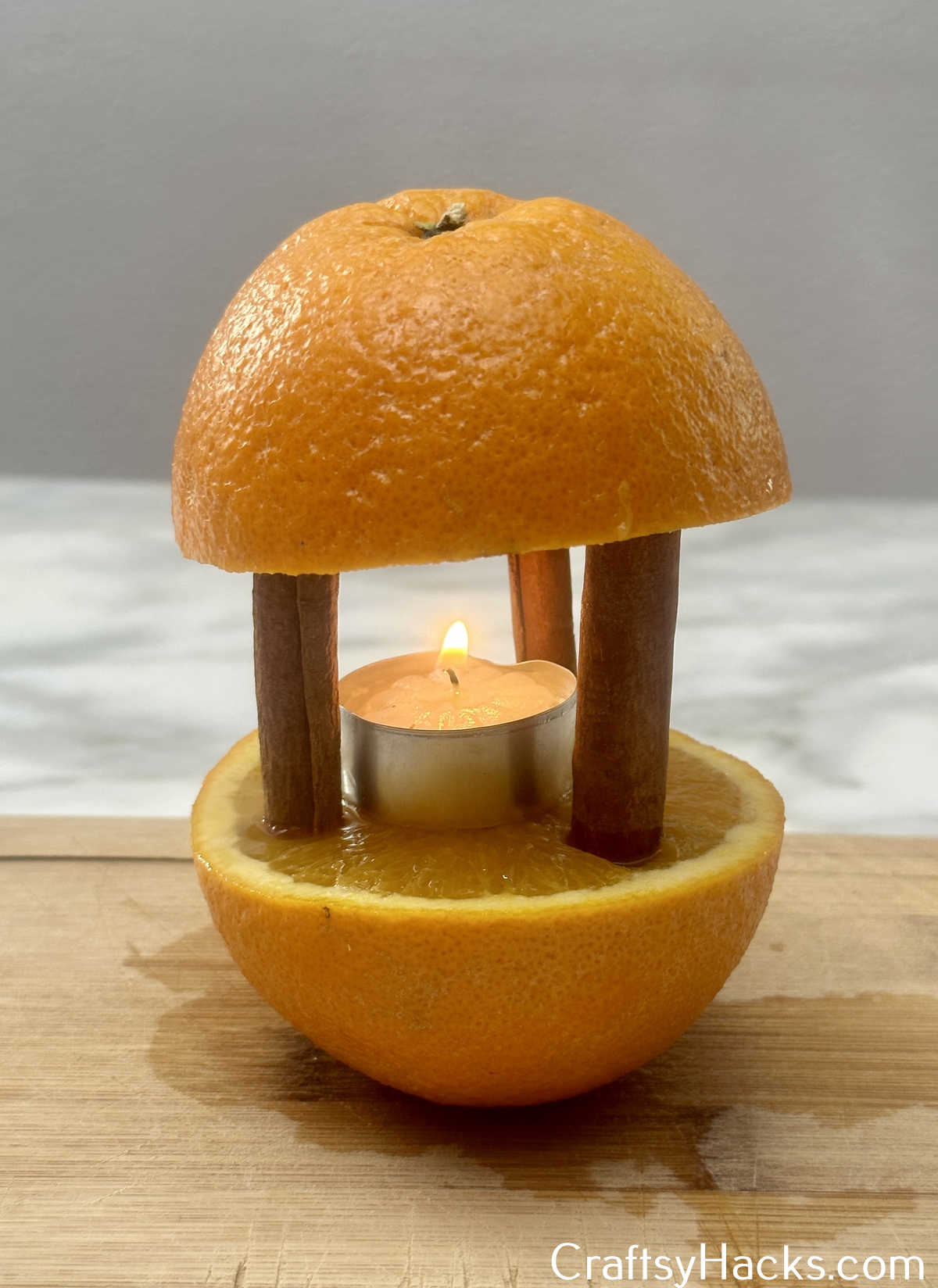 orange and cinnamon candle to keep insects away