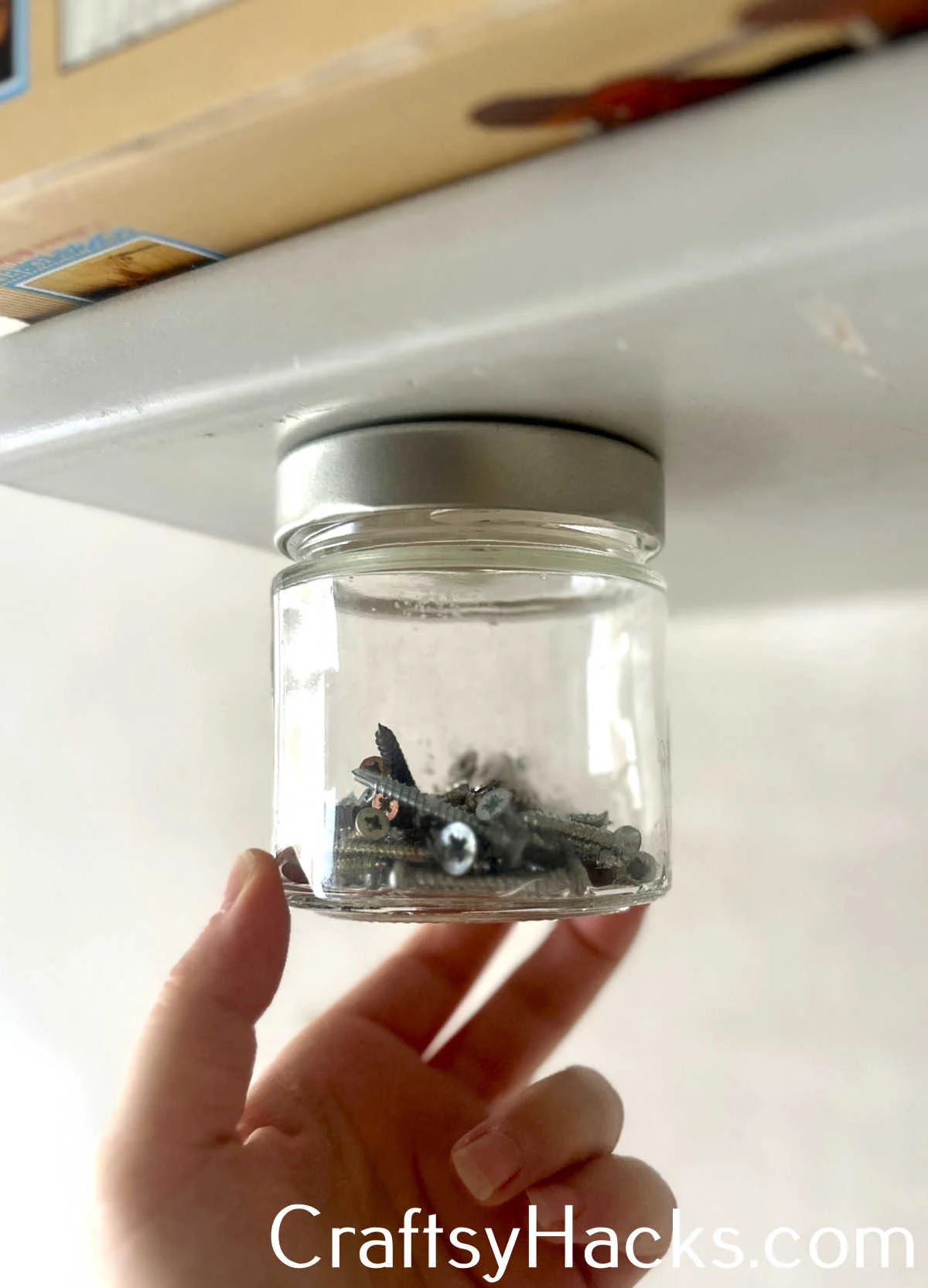 screw jar lids on shelf