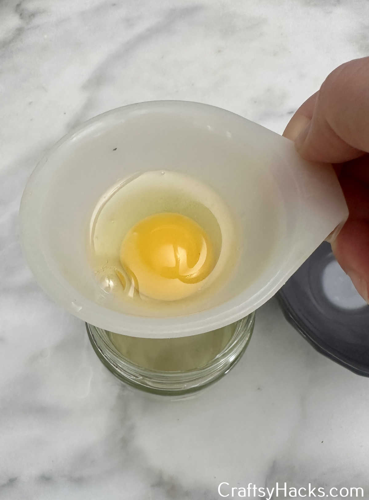 use funnel to seperate yolk from egg white