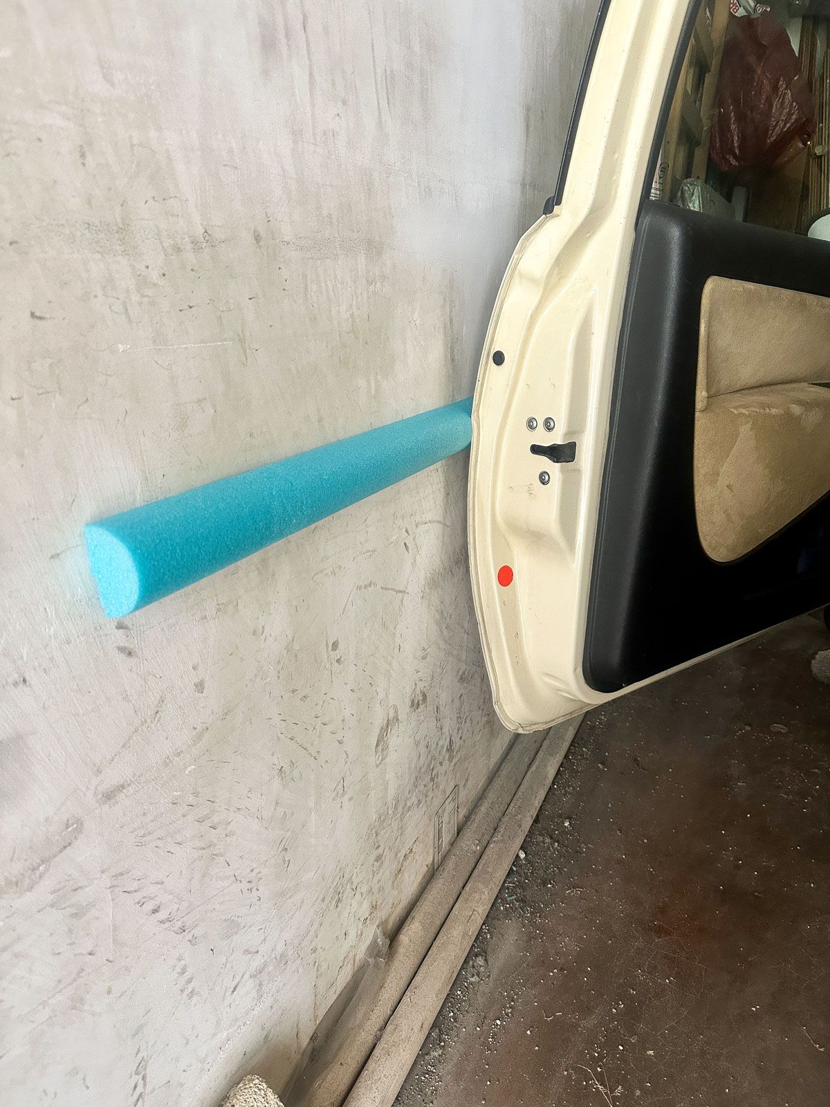 Attach a Pool Noodle to the Garage Wall to Protect Your Car
