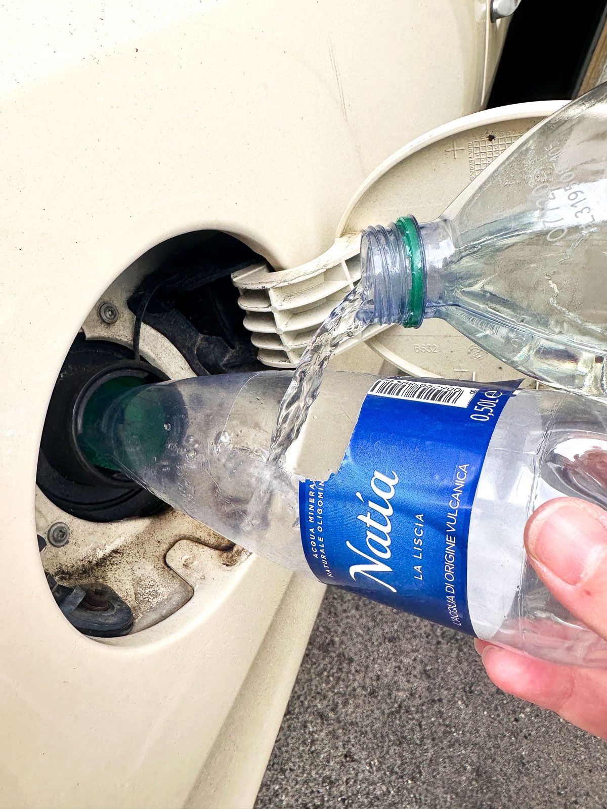 Use a Cut Bottle to Pour Gasoline Easily