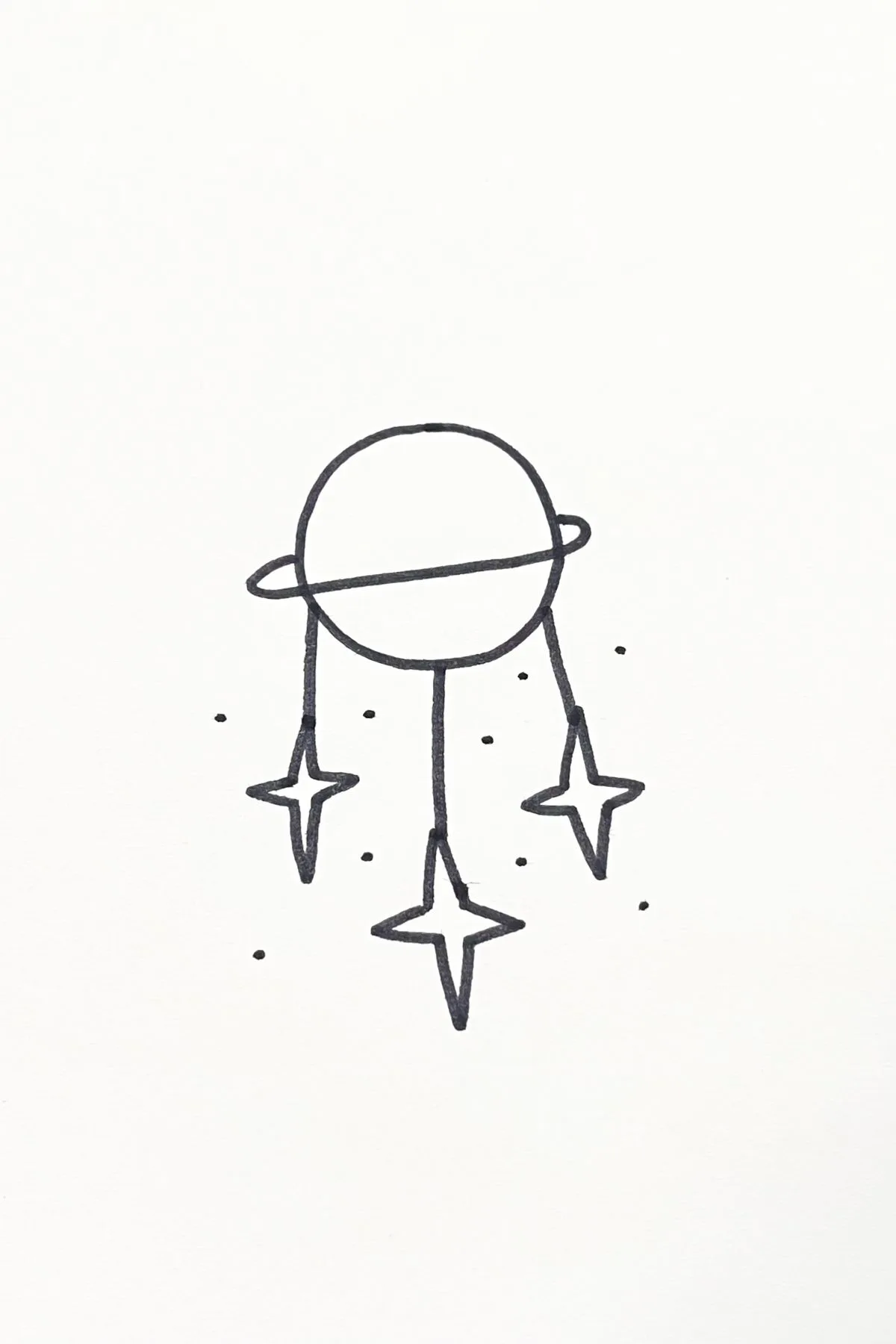 planet with hanging stars drawing idea