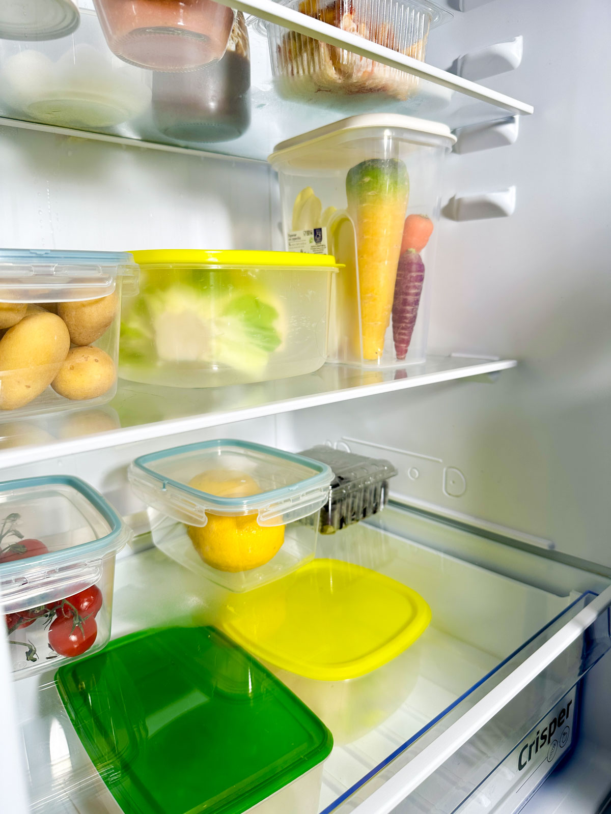 Use Plastic Containers to Organize Food in the Fridge