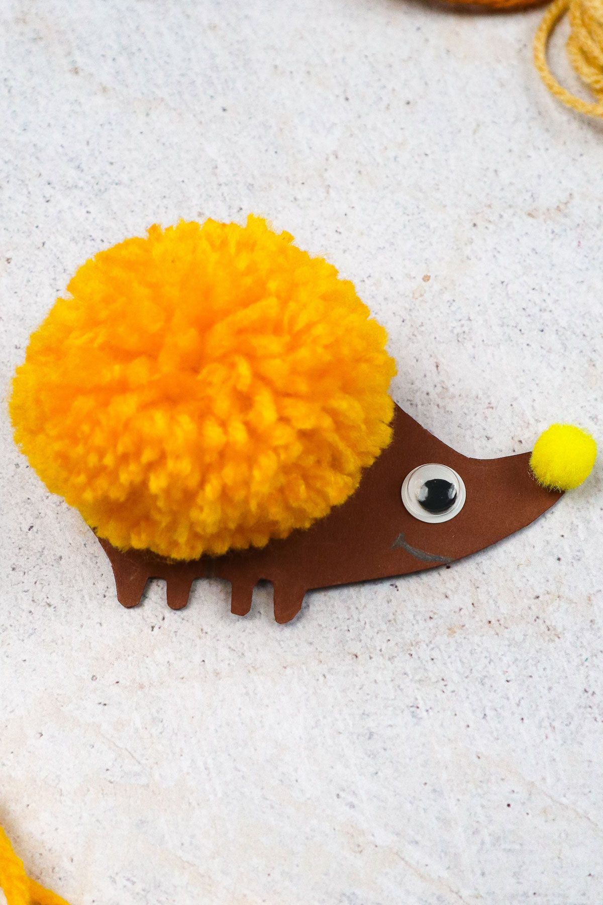 DIY pom pom hedgehog craft