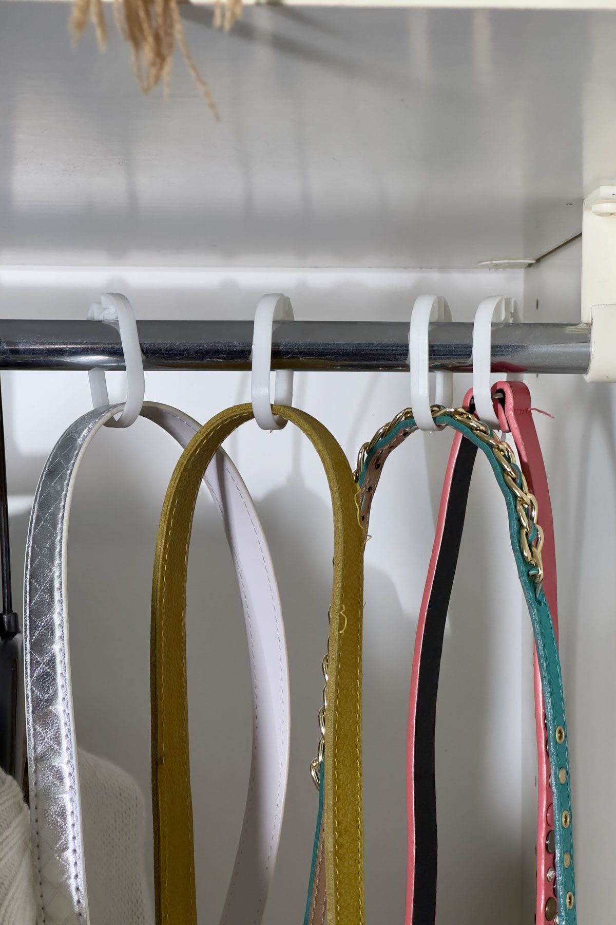 Use Shower Hooks To Organize Belts